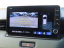 e:HEVX・HuNTパッケージ ワンオーナー車 純正9インチナビ フルセグテレビ バックカメラ シートヒーター ETC車載器 ホンダセンシング 地デジフルセグ サイドエアバッグ Bカメラ 横滑り防止機能 スマートキー オートライト(21枚目)