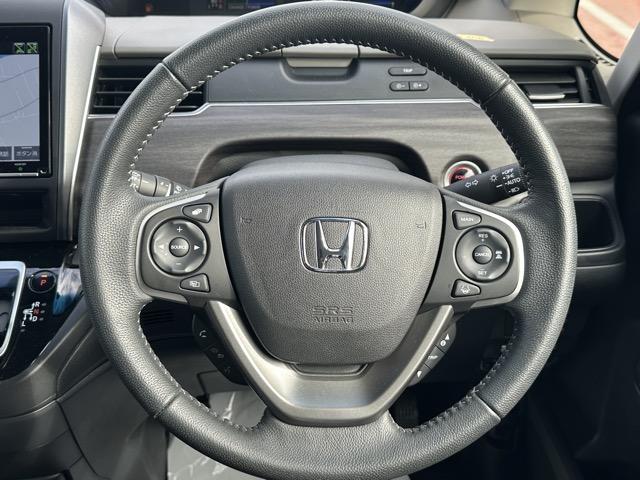 フリードハイブリッド ハイブリッド・G 7人乗り 純正ナビ(VXM-247VFNi)・バックモニター・ETC付 Sパッケージ ホンダセンシング LEDヘッドランプ 両側パワースライドドア 本革巻ステアリング ロールサンシェード スマートキー(9枚目)