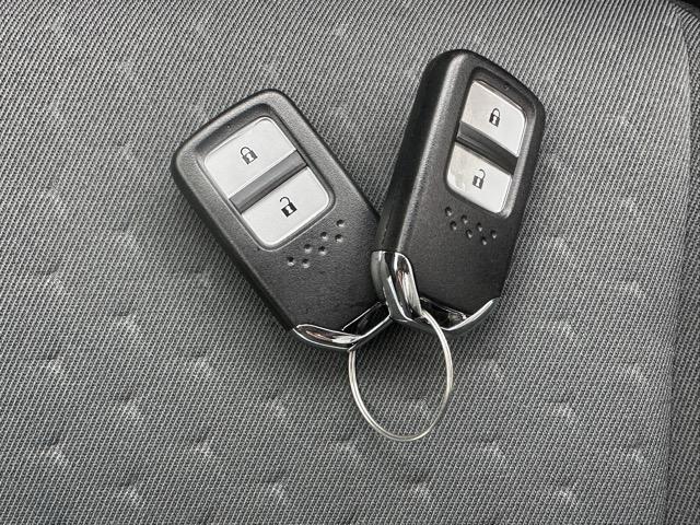 フィット e:HEVベーシック 走行距離1,611km 社外ナビ・バックモニター・ETC付 ホンダセンシング LEDヘッドランプ アダプティブクルーズコントロール 電子制御パーキングブレーキ オートブレーキホールド機能 スマートキー(27枚目)