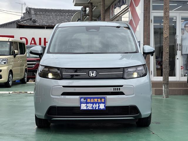 フリード e:HEVエアー EX 6人乗り 内装色/ブラック ホンダセンシング LEDヘッドライト 両側パワースライドドア 運転席&助手席シートヒーター リアクーラー 液晶メーター 本革巻ステアリング・セレクトレバー 登録済未使用車(31枚目)