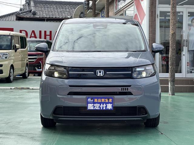 フリード ｅ：ＨＥＶエアー　ＥＸ　６人乗り　内装色／ブラック　ホンダセンシング　ＬＥＤヘッドライト　両側パワースライドドア　運転席＆助手席シートヒーター　リアクーラー　液晶メーター　本革巻ステアリング・セレクトレバー　登録済未使用車（31枚目）