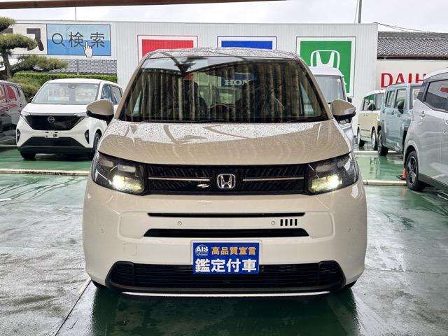 フリード ｅ：ＨＥＶエアー　ＥＸ　６人乗り　内装色／ブラック　ホンダセンシング　ＬＥＤヘッドライト　両側パワースライドドア　運転席＆助手席シートヒーター　リアクーラー　液晶メーター　本革巻ステアリング・セレクトレバー　登録済未使用車（27枚目）