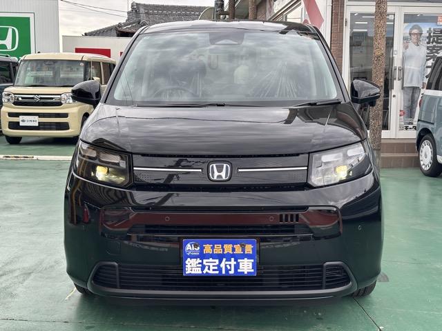 フリード ｅ：ＨＥＶエアー　ＥＸ　６人乗り　内装色／ブラック　ホンダセンシング　ＬＥＤヘッドライト　両側パワースライドドア　運転席＆助手席シートヒーター　リアクーラー　液晶メーター　本革巻ステアリング・セレクトレバー　登録済未使用車（26枚目）