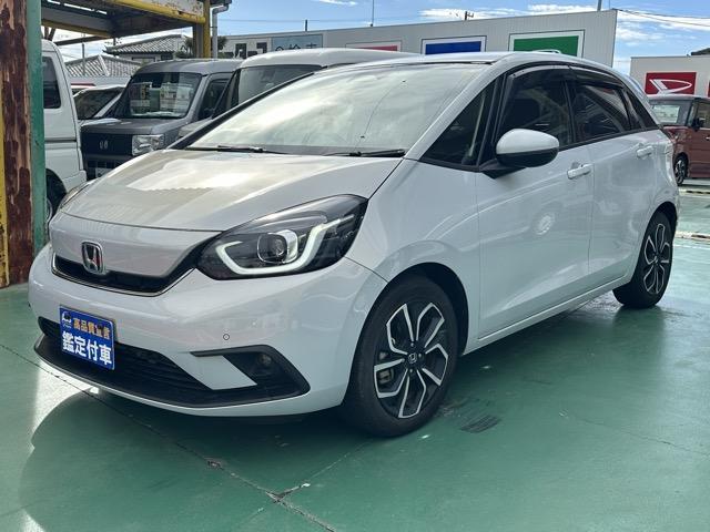 フィット ｅ：ＨＥＶホーム　純正ナビ・バックモニター・ドライブレコーダー・ＥＴＣ付　ホンダセンシング　ＬＥＤヘッドランプ　電子制御パーキングブレーキ　オートブレーキホールド機能　本革巻ステアリング　スマートキー　アルミホイール（4枚目）