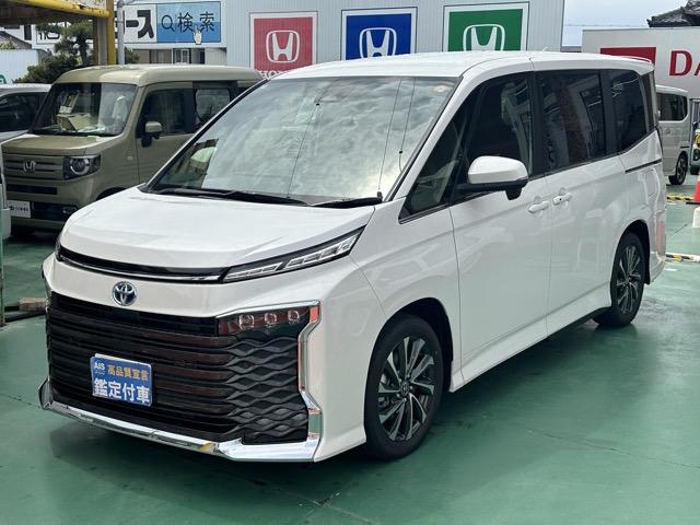 ヴォクシー ハイブリッドＳ－Ｚ　７人乗り　プロジェクター式ＬＥＤヘッドランプ　ユニバーサルステップ　１０．５インチディスプレイオーディオ　ＥＴＣ２．０　ＴＶ＋ＣＤ・ＤＶＤデッキ　両側パワースライドドア　シートヒーター　登録済未使用車（4枚目）