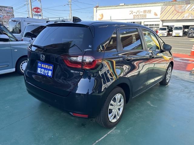 フィット ｅ：ＨＥＶホーム　純正ナビゲーション　バックカメラ　スマートキー　ＬＥＤヘッドライト　フルオートエアコン　革巻きハンドル　オートクルーズコントロール　オートライト　衝突被害軽減ブレーキ　電気式パーキングブレーキ（13枚目）