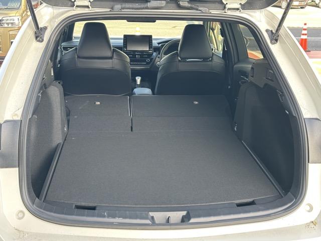 カローラツーリング ハイブリッド ダブルバイビー モデリスタエアロ&アルミホイール付 セーフティセンス LEDヘッドランプ ディスプレイオーディオ ヘッドアップディスプレイ スペアタイヤ 本革巻ステアリング シートヒーター ステアリングヒーター(13枚目)