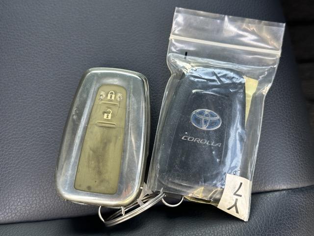 カローラツーリング ハイブリッド ダブルバイビー モデリスタエアロ&アルミホイール付 セーフティセンス LEDヘッドランプ ディスプレイオーディオ ヘッドアップディスプレイ スペアタイヤ 本革巻ステアリング シートヒーター ステアリングヒーター(19枚目)