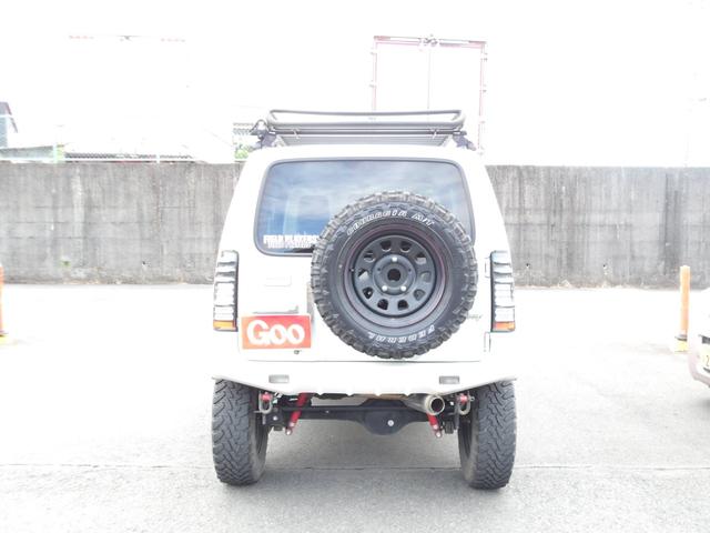 ジムニー ランドベンチャー モンスタースポーツコンプリト 1オーナー ハイトアップサスペション足回カスタム ルーフキャリアー ブースト計 社外マフラ-&グリル&前後バンパー 天井デッドニング デイトナ16インチ225/75R16(11枚目)