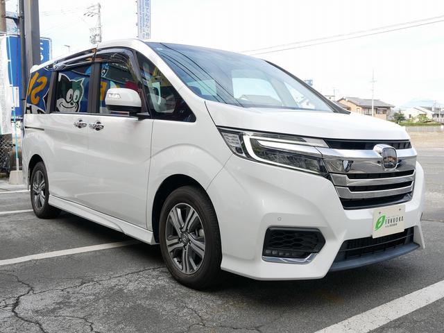 ステップワゴンスパーダ ｅ：ＨＥＶスパーダ　Ｇ・ＥＸ　ホンダセンシング　ｅ：ＨＥＶ　ホンダセンシング　９インチナビ　バックカメラ　両側電動スライドドア　シートヒーター　ＥＴＣ２．０　わくわくゲート　７人乗　スマ－トキ－（2枚目）