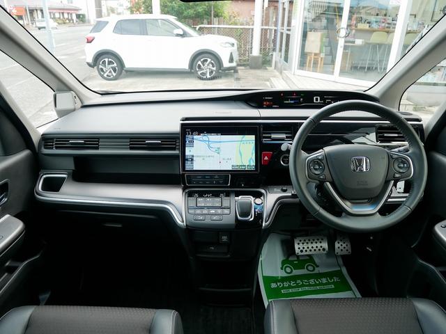 ステップワゴンスパーダ ｅ：ＨＥＶスパーダ　Ｇ・ＥＸ　ホンダセンシング　ｅ：ＨＥＶ　ホンダセンシング　９インチナビ　バックカメラ　両側電動スライドドア　シートヒーター　ＥＴＣ２．０　わくわくゲート　７人乗　スマ－トキ－（3枚目）