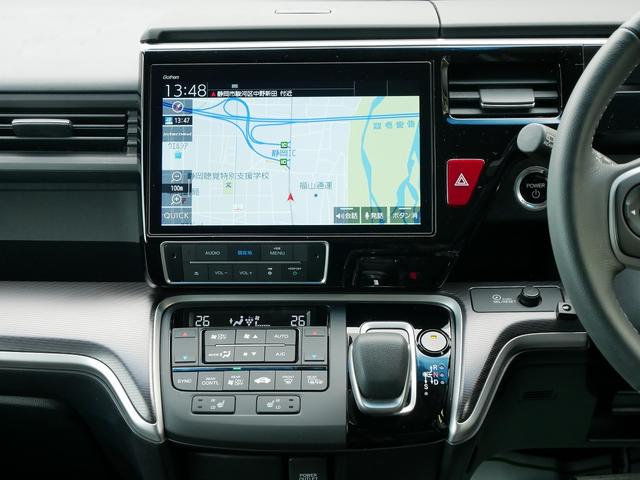 ステップワゴンスパーダ ｅ：ＨＥＶスパーダ　Ｇ・ＥＸ　ホンダセンシング　ｅ：ＨＥＶ　ホンダセンシング　９インチナビ　バックカメラ　両側電動スライドドア　シートヒーター　ＥＴＣ２．０　わくわくゲート　７人乗　スマ－トキ－（5枚目）