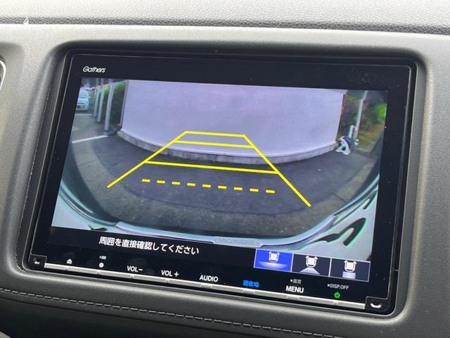 ヴェゼル ハイブリッドＺ・ホンダセンシング　純正ＳＤナビ　バックカメラ　衝突被害軽減システム　レーダークルーズ　禁煙車　ハーフレザーシート　コーナーセンサー　スマートキー　ＬＥＤヘッド　ビルトインＥＴＣ　車線逸脱警報　オートライト（4枚目）