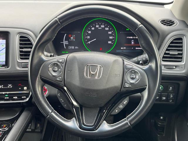 ヴェゼル ハイブリッドＺ・ホンダセンシング　純正ＳＤナビ　バックカメラ　衝突被害軽減システム　レーダークルーズ　禁煙車　ハーフレザーシート　コーナーセンサー　スマートキー　ＬＥＤヘッド　ビルトインＥＴＣ　車線逸脱警報　オートライト（12枚目）