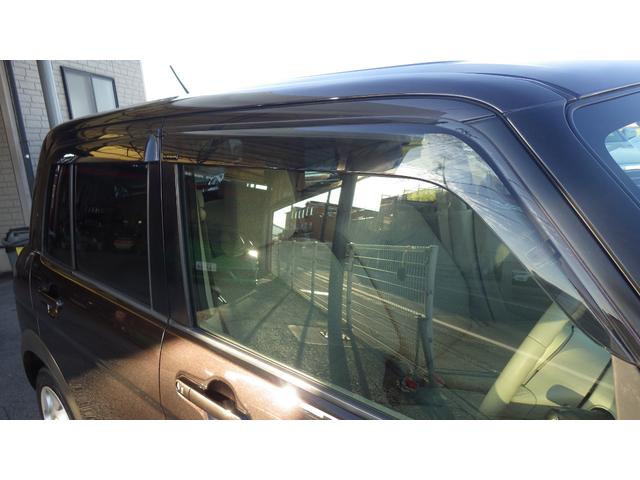 アルトラパン Ｓ　純正ディスチャージヘッドライト　禁煙車　ケンウッドＳＤナビ地デジフルセグＴＶ　ブルートゥース　ＤＶＤ再生　スマートキー＆プッシュスタート　シートヒーター　　純正ドアバイザー　アイドリングストップ（69枚目）