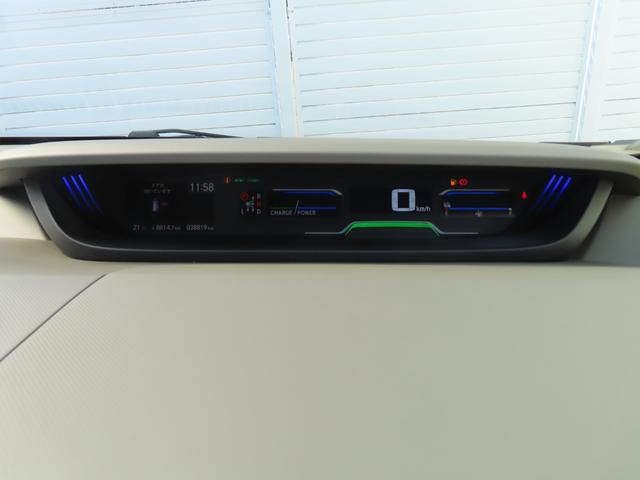 フリードハイブリッド ハイブリッド・Ｇホンダセンシング　ハイブリッド・Ｇホンダセンシング・９インチナビ・リアカメラ・ドラレコ前後・禁煙・ワンオ－　軽減ブレーキ　キーフリーシステム　１オ－ナ－　記録簿　ＤＶＤ再生可能　サイドカーテンエアバック　ＥＣＯＮ（23枚目）