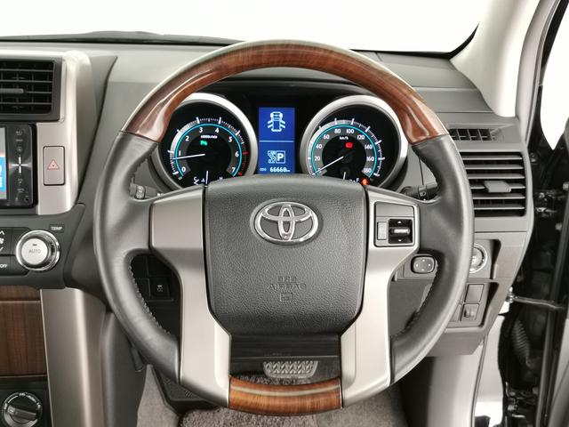 ランドクルーザープラド TX 5名 純正スポイラー 純正ルーフレール LEDヘッドライト リフトアップ 純正アルミ 前後クリアランスソナー ウッド革コンビハン シートカバー スマートキー プッシュスタート 整備記録簿(6枚目)