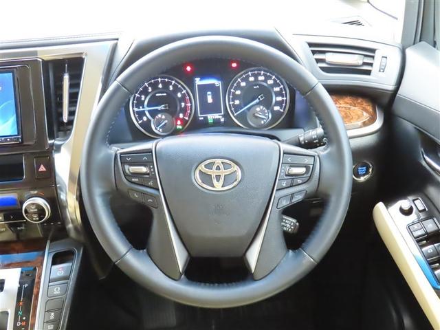 ヴェルファイア ２．５Ｘ　地デジ　ＬＥＤヘッドライト　クルーズコントロール　ＥＴＣ　ＤＶＤ　横滑り防止装置　記録簿　３列シート　盗難防止装置　オ－トエアコン　メモリーナビ　アルミホイール　Ｗエアコン　サイドエアバック　ＡＢＳ（5枚目）