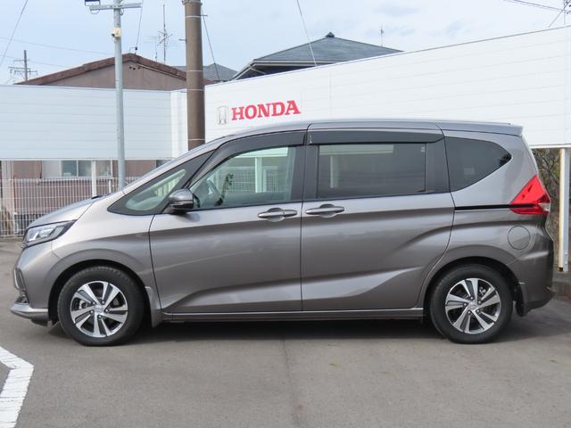 フリードハイブリッド ハイブリッド・Ｇ　６人　両側電動スライドドア　ホンダセンシング　社外前後ドライブレコーダー　ＥＴＣ２．０　メモリーナビ　Ｂｌｕｅｔｏｏｔｈ　ＵＳＢ　禁煙ワンオーナー車（4枚目）