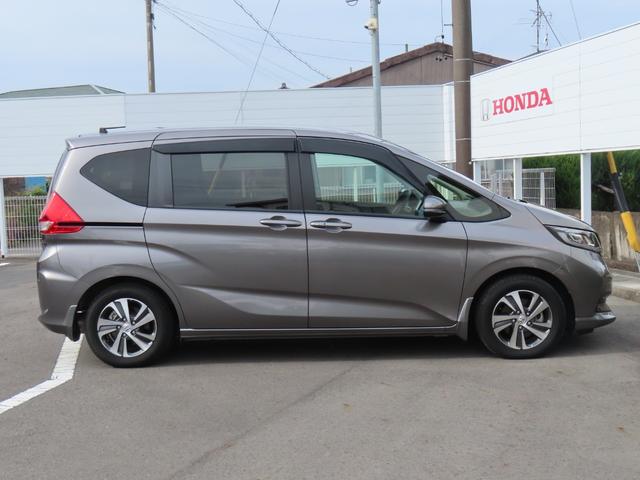 フリードハイブリッド ハイブリッド・Ｇ　６人　両側電動スライドドア　ホンダセンシング　社外前後ドライブレコーダー　ＥＴＣ２．０　メモリーナビ　Ｂｌｕｅｔｏｏｔｈ　ＵＳＢ　禁煙ワンオーナー車（5枚目）