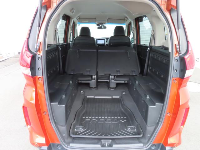 フリード+ハイブリッド ハイブリッド・クロスターホンダセンシング 9インチナビBカメラETC両側電スラフルセグ録音Bトゥース1年保証付きシートヒーター延長5年保証対応 レーダークルコン BTオーディオ 禁煙 バックカメラ 地デジフルセグ 両側電動ドア スマートキー(10枚目)