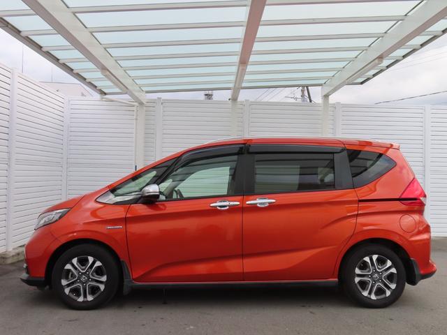 フリード+ハイブリッド ハイブリッド・クロスターホンダセンシング 9インチナビBカメラETC両側電スラフルセグ録音Bトゥース1年保証付きシートヒーター延長5年保証対応 レーダークルコン BTオーディオ 禁煙 バックカメラ 地デジフルセグ 両側電動ドア スマートキー(16枚目)