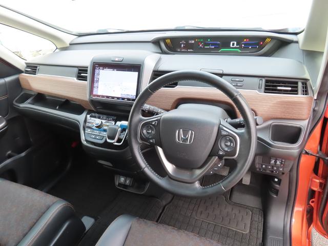 フリード+ハイブリッド ハイブリッド・クロスターホンダセンシング 9インチナビBカメラETC両側電スラフルセグ録音Bトゥース1年保証付きシートヒーター延長5年保証対応 レーダークルコン BTオーディオ 禁煙 バックカメラ 地デジフルセグ 両側電動ドア スマートキー(21枚目)