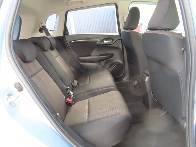 フィットハイブリッド F センシング1オーナー禁煙車検整備付延長5年保証対応 記録簿 横滑り防止装置 ACC フルオートエアコン LKAS キーフリーシステム 全席パワーウインドウ パワーステアリング ABS 電動格納ミラー(4枚目)