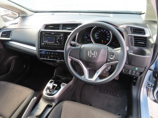 フィットハイブリッド F センシング1オーナー禁煙車検整備付延長5年保証対応 記録簿 横滑り防止装置 ACC フルオートエアコン LKAS キーフリーシステム 全席パワーウインドウ パワーステアリング ABS 電動格納ミラー(14枚目)