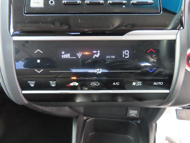 フィットハイブリッド F センシング1オーナー禁煙車検整備付延長5年保証対応 記録簿 横滑り防止装置 ACC フルオートエアコン LKAS キーフリーシステム 全席パワーウインドウ パワーステアリング ABS 電動格納ミラー(20枚目)