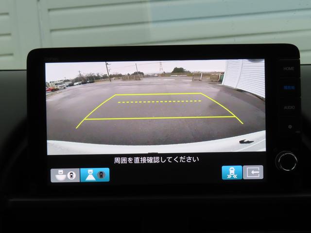 フリード ｅ：ＨＥＶクロスター　９インチナビマルチヴューカメラ前後ドラレコフルセグＢトゥース両側電スラＳヒーター　ワンオーナー　ＥＴＣ装備　マルチビュー　衝突軽減ブレーキシステム　禁煙車　オートエアコン　バックモニター　ＬＥＤライト（9枚目）