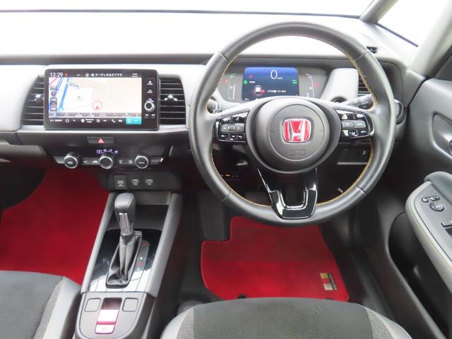 フィット ｅ：ＨＥＶＲＳ　９インチコネクトＥＴＣ２．０Ｂカメラ２年保証車検整備付フルセグＢトゥースパドルシフト最長５年保証対応アルミ　レーダークルーズ　エアバッグ　ナビ＆ＴＶ　パワーウィンドウ　助手席エアバッグ　レーンアシスト（17枚目）