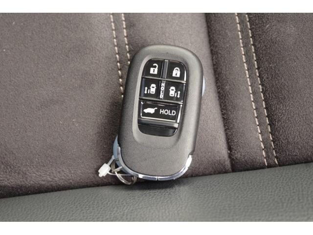 ステップワゴン ｅ：ＨＥＶスパーダ　プレミアムライン　ＬＥＤヘッドライト　１７インチアルミ　パワーテールゲート　両側パワースライドドア　２列目シートヒーター　スマートキー　フルセグＴＶ　１０．１型後席用フリップダウンモニター　全方位カメラ　ＥＴＣ（26枚目）