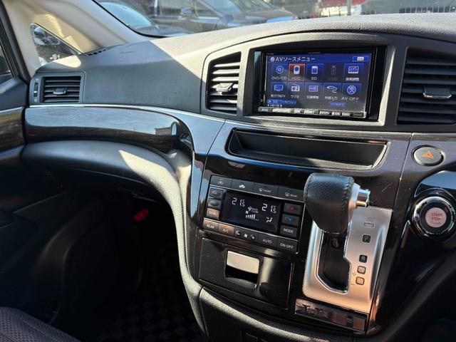 エルグランド ２５０ハイウェイスター　両側パワースライドドア　ナビ　後席モニター　ＴＶ　ＥＴＣ　Ｂカメラ　ＣＤ／ＤＶＤ　純正１８インチＡＷ　オットマン　オートライト　フォグランプ　スマートキー（24枚目）