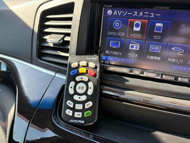 エルグランド ２５０ハイウェイスター　両側パワースライドドア　ナビ　後席モニター　ＴＶ　ＥＴＣ　Ｂカメラ　ＣＤ／ＤＶＤ　純正１８インチＡＷ　オットマン　オートライト　フォグランプ　スマートキー（28枚目）