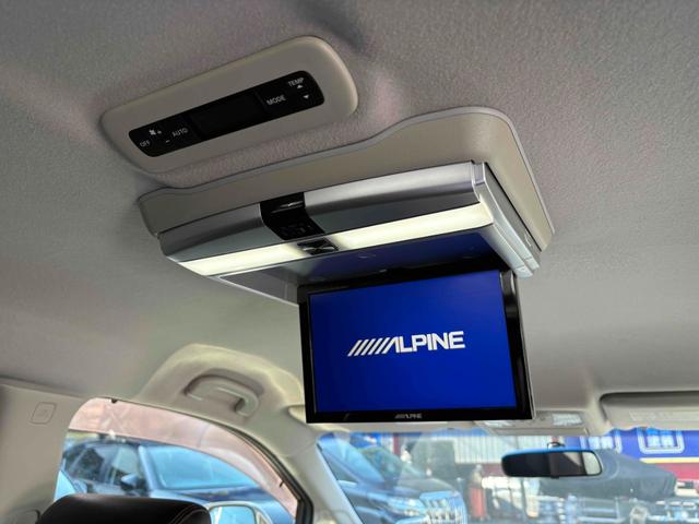 エルグランド ２５０ハイウェイスター　両側パワースライドドア　ナビ　後席モニター　ＴＶ　ＥＴＣ　Ｂカメラ　ＣＤ／ＤＶＤ　純正１８インチＡＷ　オットマン　オートライト　フォグランプ　スマートキー（29枚目）