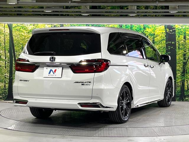 オデッセイハイブリッド ｅ：ＨＥＶアブソルート・ＥＸ　禁煙　ホンダセンシング　純正１０型ナビ　全周囲カメラ　フリップダウンモニター　両側電動スライド　パワーシート　電動リアゲート　ＡＣ１００Ｖ　コーナーセンサー　電動パーキングブレーキ　リアオートエアコン（17枚目）