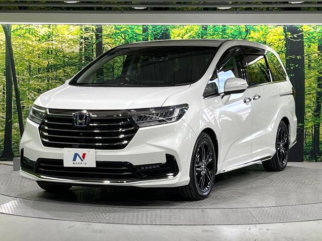 オデッセイハイブリッド ｅ：ＨＥＶアブソルート・ＥＸ　禁煙　ホンダセンシング　純正１０型ナビ　全周囲カメラ　フリップダウンモニター　両側電動スライド　パワーシート　電動リアゲート　ＡＣ１００Ｖ　コーナーセンサー　電動パーキングブレーキ　リアオートエアコン（48枚目）