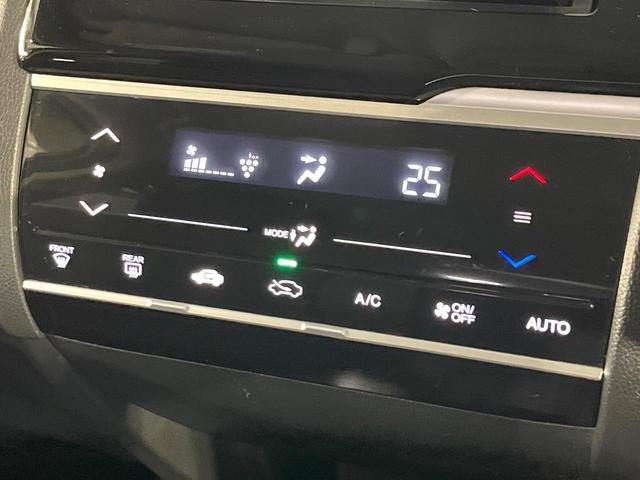 フィット 13G・Fパッケージ 禁煙車 メモリーナビ Bluetooth再生 地デジ オートエアコン ETC アイドリングストップ ライトレベライザー シートリフター 電動格納ミラー ウィンカーミラー(4枚目)