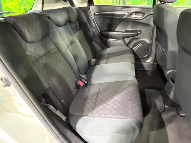 フィット 13G・Fパッケージ 禁煙車 メモリーナビ Bluetooth再生 地デジ オートエアコン ETC アイドリングストップ ライトレベライザー シートリフター 電動格納ミラー ウィンカーミラー(9枚目)