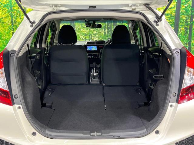 フィット 13G・Fパッケージ 禁煙車 メモリーナビ Bluetooth再生 地デジ オートエアコン ETC アイドリングストップ ライトレベライザー シートリフター 電動格納ミラー ウィンカーミラー(10枚目)