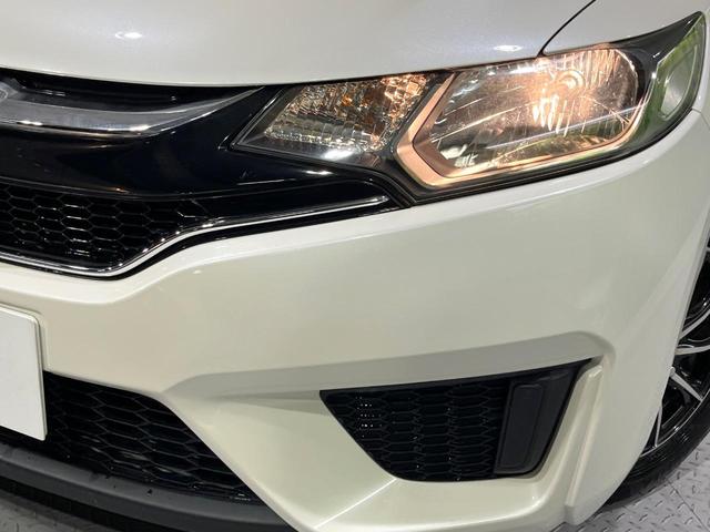 フィット 13G・Fパッケージ 禁煙車 メモリーナビ Bluetooth再生 地デジ オートエアコン ETC アイドリングストップ ライトレベライザー シートリフター 電動格納ミラー ウィンカーミラー(12枚目)