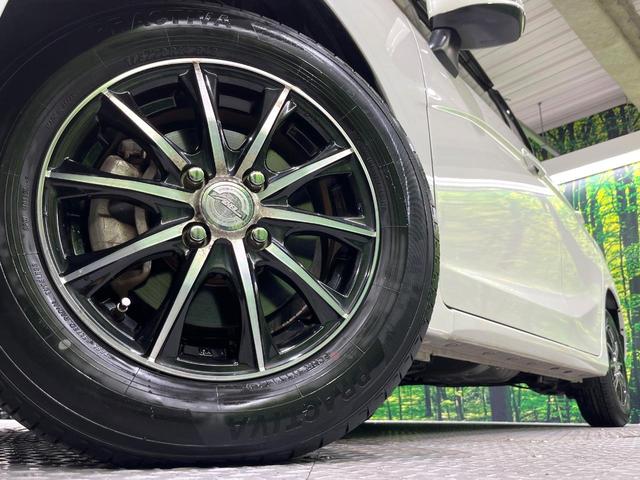 フィット 13G・Fパッケージ 禁煙車 メモリーナビ Bluetooth再生 地デジ オートエアコン ETC アイドリングストップ ライトレベライザー シートリフター 電動格納ミラー ウィンカーミラー(13枚目)
