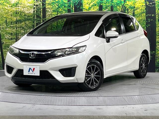 フィット 13G・Fパッケージ 禁煙車 メモリーナビ Bluetooth再生 地デジ オートエアコン ETC アイドリングストップ ライトレベライザー シートリフター 電動格納ミラー ウィンカーミラー(31枚目)