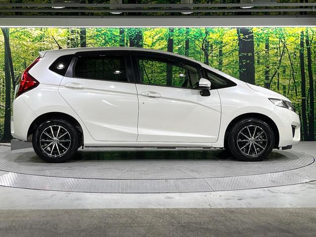 フィット 13G・Fパッケージ 禁煙車 メモリーナビ Bluetooth再生 地デジ オートエアコン ETC アイドリングストップ ライトレベライザー シートリフター 電動格納ミラー ウィンカーミラー(32枚目)