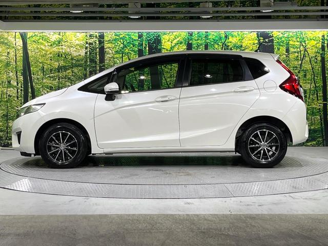 フィット 13G・Fパッケージ 禁煙車 メモリーナビ Bluetooth再生 地デジ オートエアコン ETC アイドリングストップ ライトレベライザー シートリフター 電動格納ミラー ウィンカーミラー(34枚目)