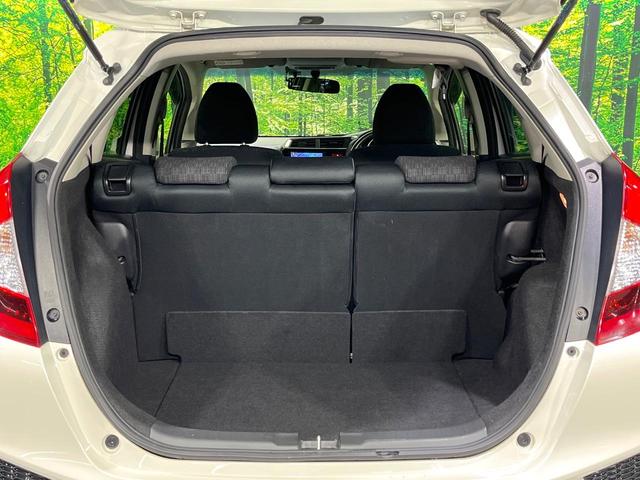 フィット 13G・Fパッケージ 禁煙車 メモリーナビ Bluetooth再生 地デジ オートエアコン ETC アイドリングストップ ライトレベライザー シートリフター 電動格納ミラー ウィンカーミラー(38枚目)