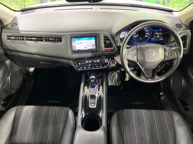 ヴェゼル ハイブリッドZ 禁煙車 衝突軽減装置 純正ナビ バックカメラ 前席シートヒーター パドルシフト ETC 電動パーキングブレーキ LEDライト オートライト オートエアコン シートリフター スマートキー 純正17AW(2枚目)