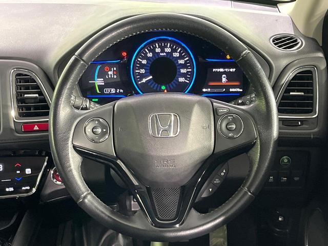 ヴェゼル ハイブリッドZ 禁煙車 衝突軽減装置 純正ナビ バックカメラ 前席シートヒーター パドルシフト ETC 電動パーキングブレーキ LEDライト オートライト オートエアコン シートリフター スマートキー 純正17AW(11枚目)