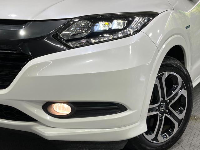 ヴェゼル ハイブリッドZ 禁煙車 衝突軽減装置 純正ナビ バックカメラ 前席シートヒーター パドルシフト ETC 電動パーキングブレーキ LEDライト オートライト オートエアコン シートリフター スマートキー 純正17AW(12枚目)